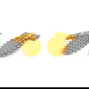 TIFFANY & CO., YELLOW GOLD CUFFLINKS: TIFFANY & CO., YELLOW GOLD CUFFLINKS 18 karat yellow gold. 5/8 inch wide. Stamp: TIFFANY & CO. BELGIUM 18Kt. Gross weight: 10.20 dwt.