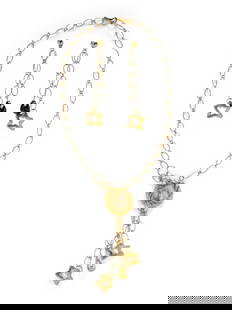 OXO, YELLOW GOLD NECKLACE AND EARRINGS: OXO, YELLOW GOLD NECKLACE AND EARRINGS Including a necklace and earrings, the earrings with black onyx beads. 14 karat yellow gold. Necklace: 25 inches long. Earrings: 3 1/2 inches long. Necklace