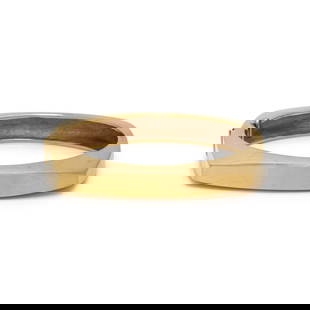 YELLOW GOLD BANGLE BRACELET: YELLOW GOLD BANGLE BRACELET Hinged with side clasp. Yellow gold. 5 3/4 inches inner circumference, 1/4 inch wide. Gross weight: 33.70 dwt.