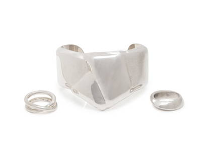 TIFFANY & CO., COLLECTION OF STERLING SILVER JEWELRY: TIFFANY &amp; CO., COLLECTION OF STERLING SILVER JEWELRY Including an Elsa Peretti Knot cuff bracelet, a Paloma Picasso Crossover ring, and an Angela Cummings ring. Cuff: 6 inches inner circumference.