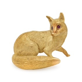 HERMÈS, YELLOW GOLD AND RUBY FOX BROOCH