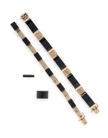 COLLECTION OF YELLOW GOLD AND BLACK JADE JEWELRY
