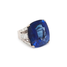 FRENCH, SYNTHETIC SAPPHIRE AND DIAMOND RING