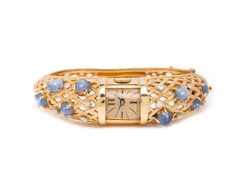 LUCIEN PICARD, YELLOW GOLD, STAR SAPPHIRE, AND DIAMOND BRACELET WATCH