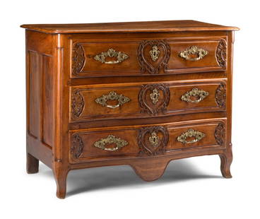 A French Provincial Walnut Commode: A French Provincial Walnut Commode 18th Century Height 40 x width 52 1/2 x depth 27 inches. This lot is located in Chicago.