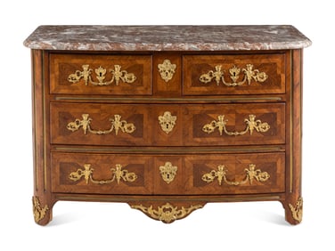 A Régence Gilt Bronze Mounted Walnut Parquetry Commode