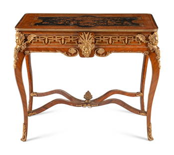 A Régence Style Gilt Bronze Mounted Kingwood and Floral Marquetry Table: A R&#233;gence Style Gilt Bronze Mounted Kingwood and Floral Marquetry Table Early 20th Century Height 36 3/4 x width 41 3/4 x depth 22 1/4 inches. This lot is located in Chicago.