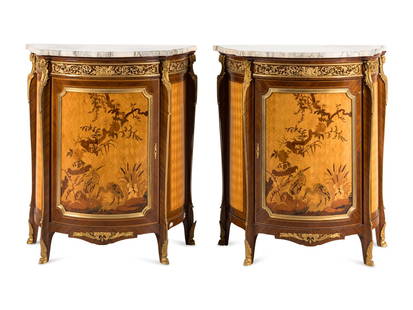 A Pair of Louis XV Style Gilt Bronze Mounted Marquetry Marble-Top Cabinets: A Pair of Louis XV Style Gilt Bronze Mounted Marquetry Marble-Top Cabinets 20th Century Height 43 x width 38 x depth 18 inches. Property of a California Collector This lot is located in Chicago.