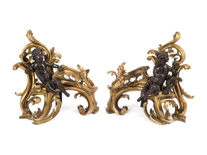 A Pair of Louis XV Style Gilt and Patinated Bronze Figural Chenets: A Pair of Louis XV Style Gilt and Patinated Bronze Figural Chenets 19th Century Height 18 x width 18 x depth 9 inches. This lot is located in Chicago.