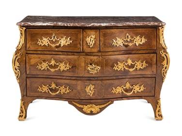 A Louis XV Gilt Bronze Mounted Tulipwood Commode