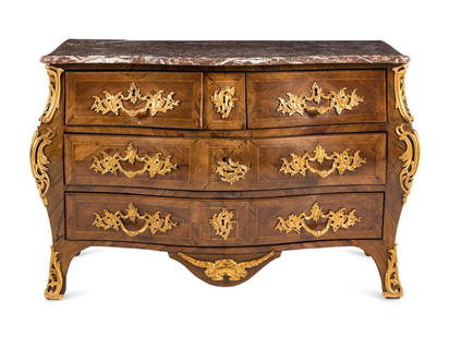 A Louis XV Gilt Bronze Mounted Tulipwood Commode: A Louis XV Gilt Bronze Mounted Tulipwood Commode Mid-18th Century indistinctly stamped to proper top left front corner of the case. Height 35 x width 54 x depth 26 inches. Property of a California Col