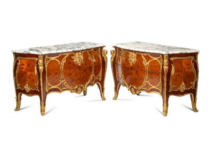 A Pair of Louis XV Style Gilt Bronze Mounted Marquetry Marble-Top Commodes: A Pair of Louis XV Style Gilt Bronze Mounted Marquetry Marble-Top Commodes 20th Century Height 37 x width 61 x depth 27 inches. This lot is located in Chicago.