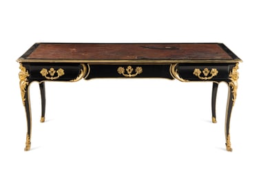 A Louis XV Style Gilt Bronze Mounted Ebonized Bureau Plat