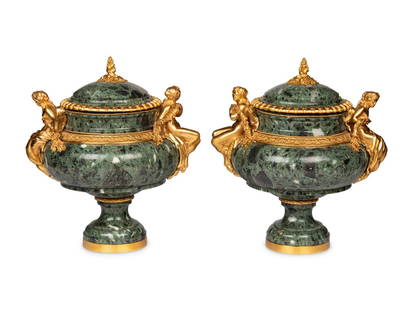 A Pair of French Gilt Bronze Mounted Marble Urns: A Pair of French Gilt Bronze Mounted Marble Urns 20th Century Height 16 x width 15 x depth 12 inches. Property of a California Collector This lot is located in Chicago. Provenance: Bonhams, Los Angele