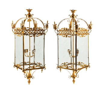 A Pair of Louis XVI Style Gilt Bronze and Etched Glass Hall Lanterns: A Pair of Louis XVI Style Gilt Bronze and Etched Glass Hall Lanterns 20th Century Height 48 x width 19 x depth 19 inches. This lot is located in Chicago.