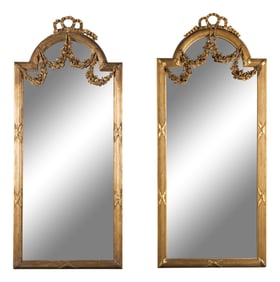 A Pair of Louis XVI Style Carved Giltwood Pier Mirrors