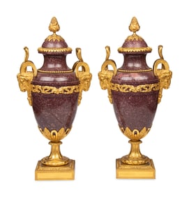 A Pair of Louis XVI Style Gilt Bronze Mounted Porphyry Urns