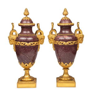 A Pair of Louis XVI Style Gilt Bronze Mounted Porphyry Urns: A Pair of Louis XVI Style Gilt Bronze Mounted Porphyry Urns 19th Century Height 24 1/4 x width 11 x depth 8 inches. Property of a California Collector This lot is located in Chicago. Provenance: Bonha