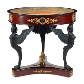 An Empire Style Gilt Metal Mounted and Part-Ebonized Mahogany Jardinière Table