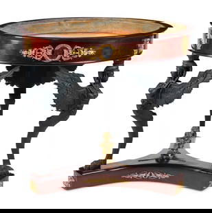 An Empire Style Gilt Metal Mounted and Part-Ebonized Mahogany Jardinière Table: An Empire Style Gilt Metal Mounted and Part-Ebonized Mahogany Jardini&#232;re Table 20th Century Height 35 3/4 x diameter 39 inches. This lot is located in Chicago.