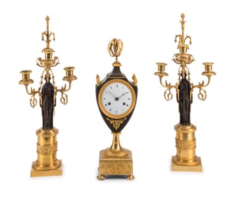 An Empire Gilt and Patinated Bronze Clock Garniture
