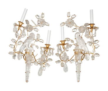 A Pair of Rock Crystal and Gilt Metal Two-Light Wall Sconces: A Pair of Rock Crystal and Gilt Metal Two-Light Wall Sconces Manner of Maison Baguès, 20th Century Height 22 x width 15 inches. Property of a California Collector This lot is located in Chicago.