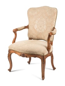 An Italian Carved Walnut Armchair