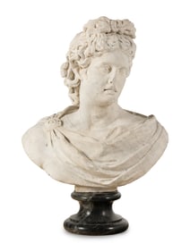 A Continental Carved Marble Bust of the Apollo Belvedere