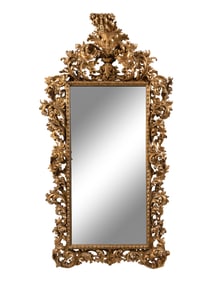A Large Italian Baroque Style Carved Giltwood Mirror