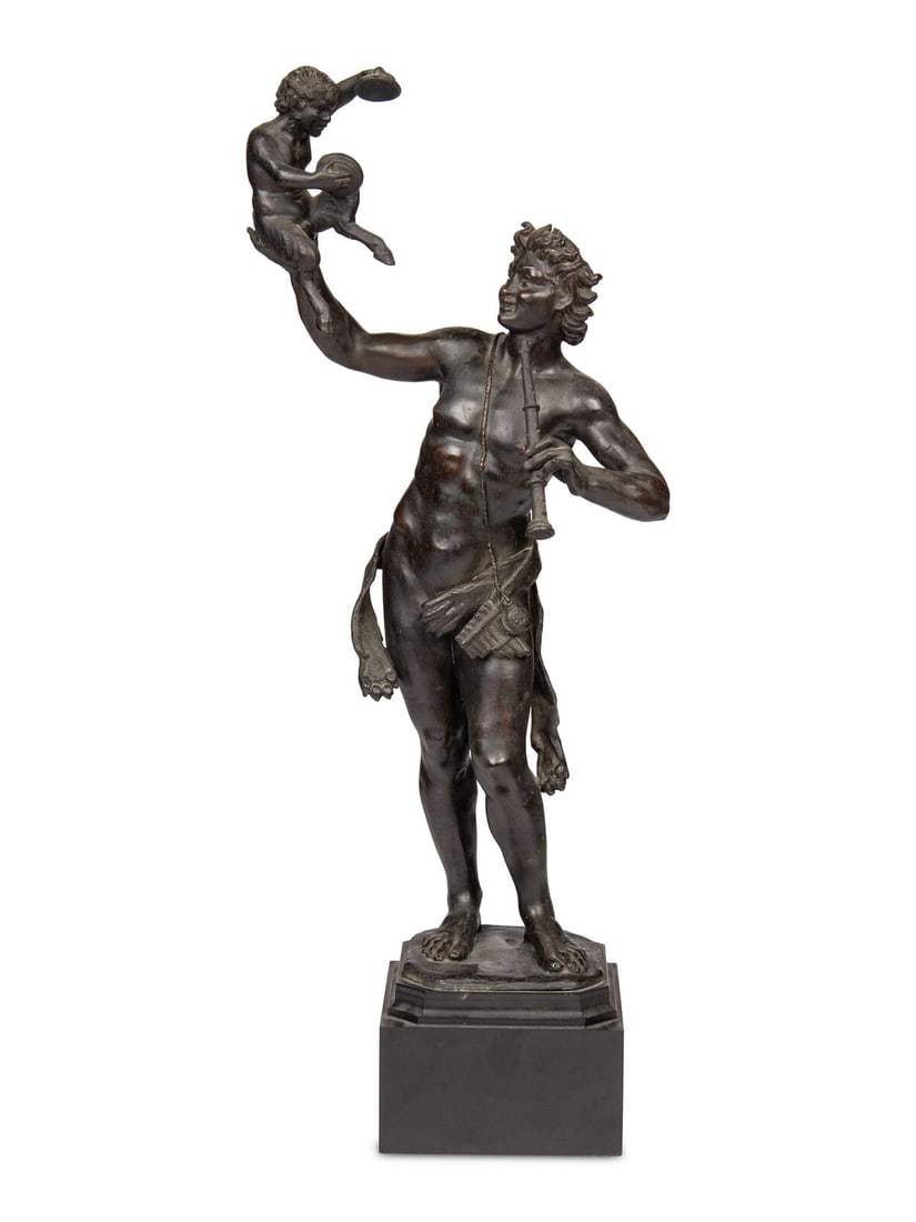 A Grand Tour Bronze Figural Group: A Grand Tour Bronze Figural Group 19th Century of Pan and a satyr, raised on a slate base. Height of figure 22 inches. Property from the Historic Dr. John McLean House, Pullman, Chicago This lot is lo