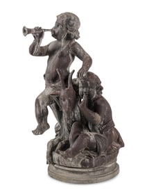 A Cast Lead Figural Group