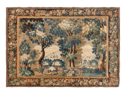 A Continental Verdure Tapestry: A Continental Verdure Tapestry 18th Century 5 feet 6 inches x 7 feet 3 inches. This lot is located in Chicago. Provenance: Eldred's, East Dennis, Massachusetts, Fine, Decorative and Asian Art Sale, Lo