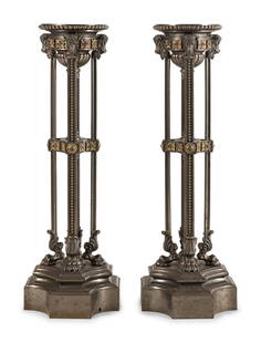 A Pair of Continental Neoclassical Style Gilt Bronze and Polished Steel Pedestals: A Pair of Continental Neoclassical Style Gilt Bronze and Polished Steel Pedestals Early 20th Century Height 52 x diameter of tops 13 inches. Property of a California Collector This lot is located in