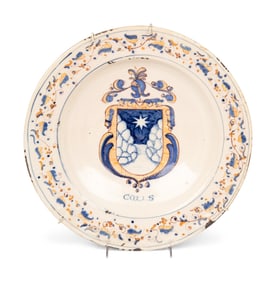 A Dutch Glazed Earthenware Armorial Charger