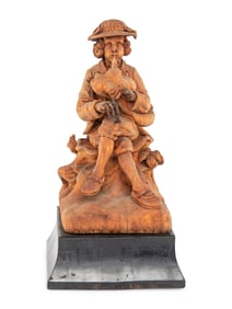 A Continental Carved Wood Statue of a Bagpipe Player