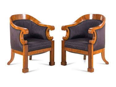 A Pair of Biedermeier Walnut Bergères