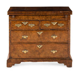 A Queen Anne Feather-Banded Burl Walnut Flip-Top Bachelor's Chest: A Queen Anne Feather-Banded Burl Walnut Flip-Top Bachelor's Chest Circa 1700 Height 31 3/4 x width 37 x depth 15 1/2 inches (closed). Property of a California Collector This lot is located in Chicago.
