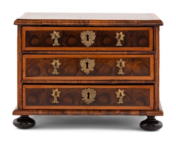 A George I Oysterwood Diminutive Chest of Drawers