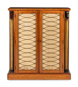 A Regency Satinwood, Part Ebonized and Parcel Gilt Cabinet