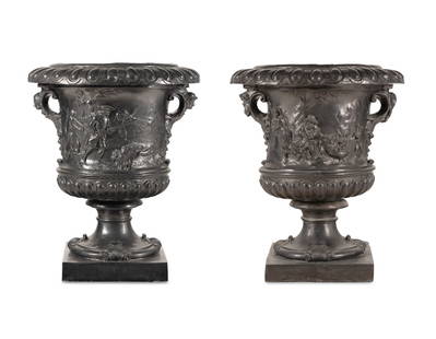A Pair of English Lead Allegorical Garden Urns: A Pair of English Lead Allegorical Garden Urns Mid-Late 18th Century emblematic of Autumn and Winter, together with a pair of modern plinth bases (not illustrated). Height 41 1/2 x width 35 x depth 35