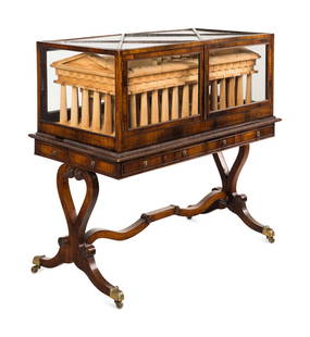 A Carved Wood Model of the Paestum Temple of Hera II in a Rosewood Display Case: A Carved Wood Model of the Paestum Temple of Hera II in a Rosewood Display Case The Temple Modern, The Display Case 19th Century and Later Height overall (including case) 47 1/4 x width 50 1/2 x depth