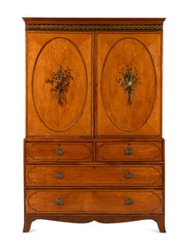 An Edwardian Painted Satinwood Linen Press