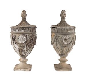 A Pair of Lead Garden Urns and Covers