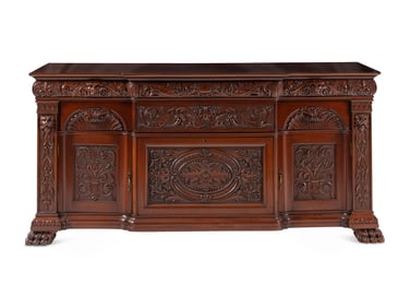 A Renaissance Revival Carved Mahogany Serving Cabinet