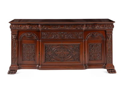 A Renaissance Revival Carved Mahogany Serving Cabinet: A Renaissance Revival Carved Mahogany Serving Cabinet Attributed to R.J. Horner, 19th Century Height 35 x width 73 x depth 27 1/2 inches. This lot is located in Chicago.