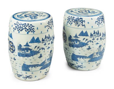 A Pair of Chinese Blue and White Porcelain Garden Seats: A Pair of Chinese Blue and White Porcelain Garden Seats 20th Century Height 22 x diameter 16 inches. This lot is located in Chicago.
