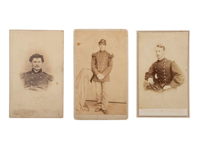 [CIVIL WAR]. 3 CDVs of US marines, incl. postwar example featuring globe and anchor insignia. : [CIVIL WAR]. 3 CDVs of US marines, incl. postwar example featuring globe and anchor insignia. Full standing portrait of a postwar marine wearing a double-breasted frock coat with epaulettes and headge
