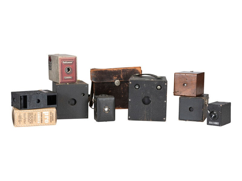 [EARLY PHOTOGRAPHY] 13 cameras incl. Kodak and Blair examples, with various manuals and guides. (1 of 2)