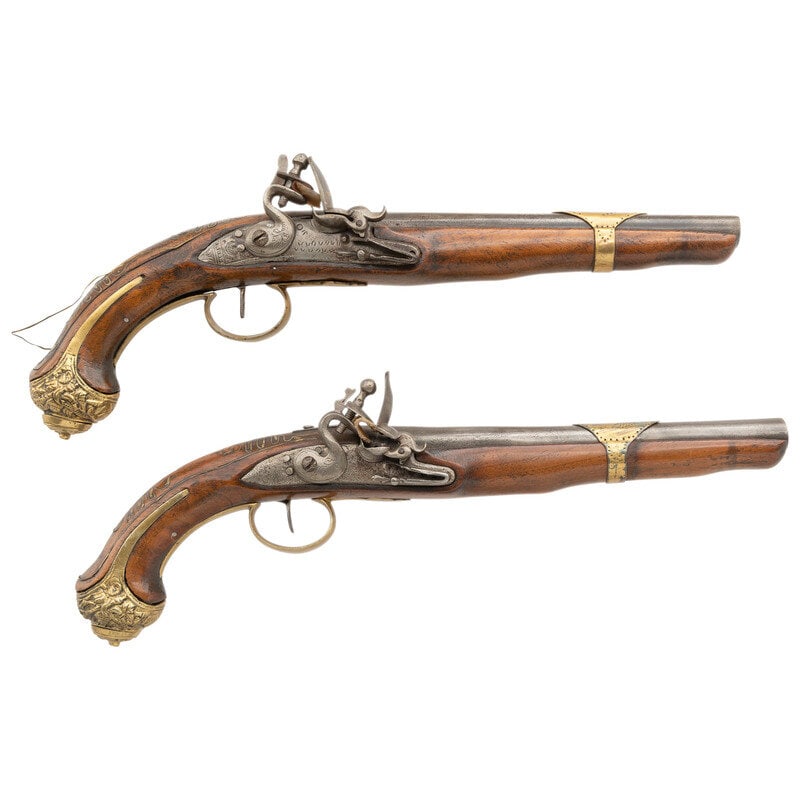 Pair of Decorative Ottoman Flintlock Pistols: Pair of Decorative Ottoman Flintlock Pistols .62 caliber. 9.375" barrels. NSN. Bright barrels and locks, brass furniture, brass wire inlay, hardwood stocks. Non-functional, non-gun decorative flintloc