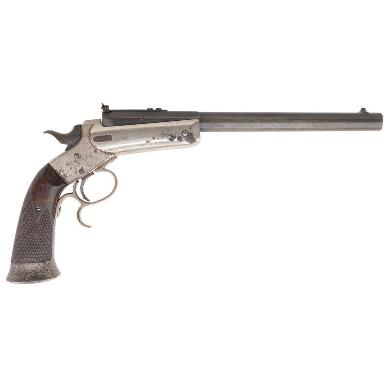 J. Stevens-Conlin No. 38 .22 Caliber Target Pistol: J. Stevens-Conlin No. 38 .22 Caliber Target Pistol .22 LR. 10" barrel length. SN: 746. Blued metal finish with nickel plated frame and triggerguard mounting checkered walnut grips, and adjustable targ